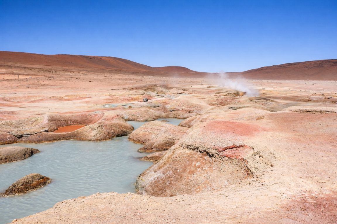 Sol de Mañana geyser field with volcanic terrain and steaming fumaroles in Bolivia, captured on a tour with Salar de Uyuni Tours